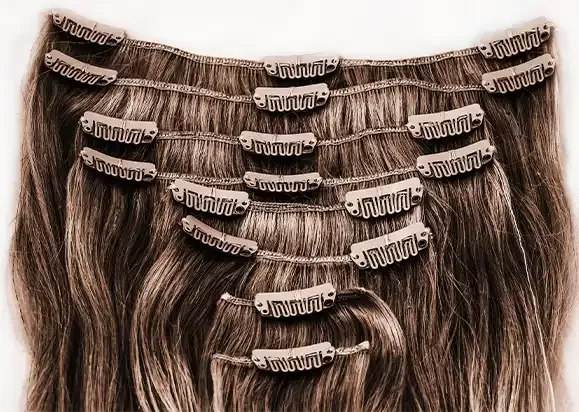 A clip-in set laid out before fitting