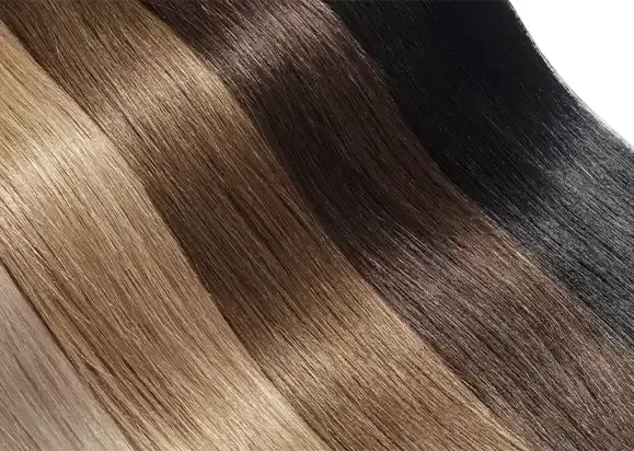 Extension hair in several shades, from dark brown through to blonde